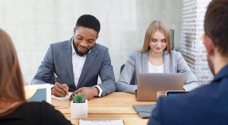 taking notes during an interview